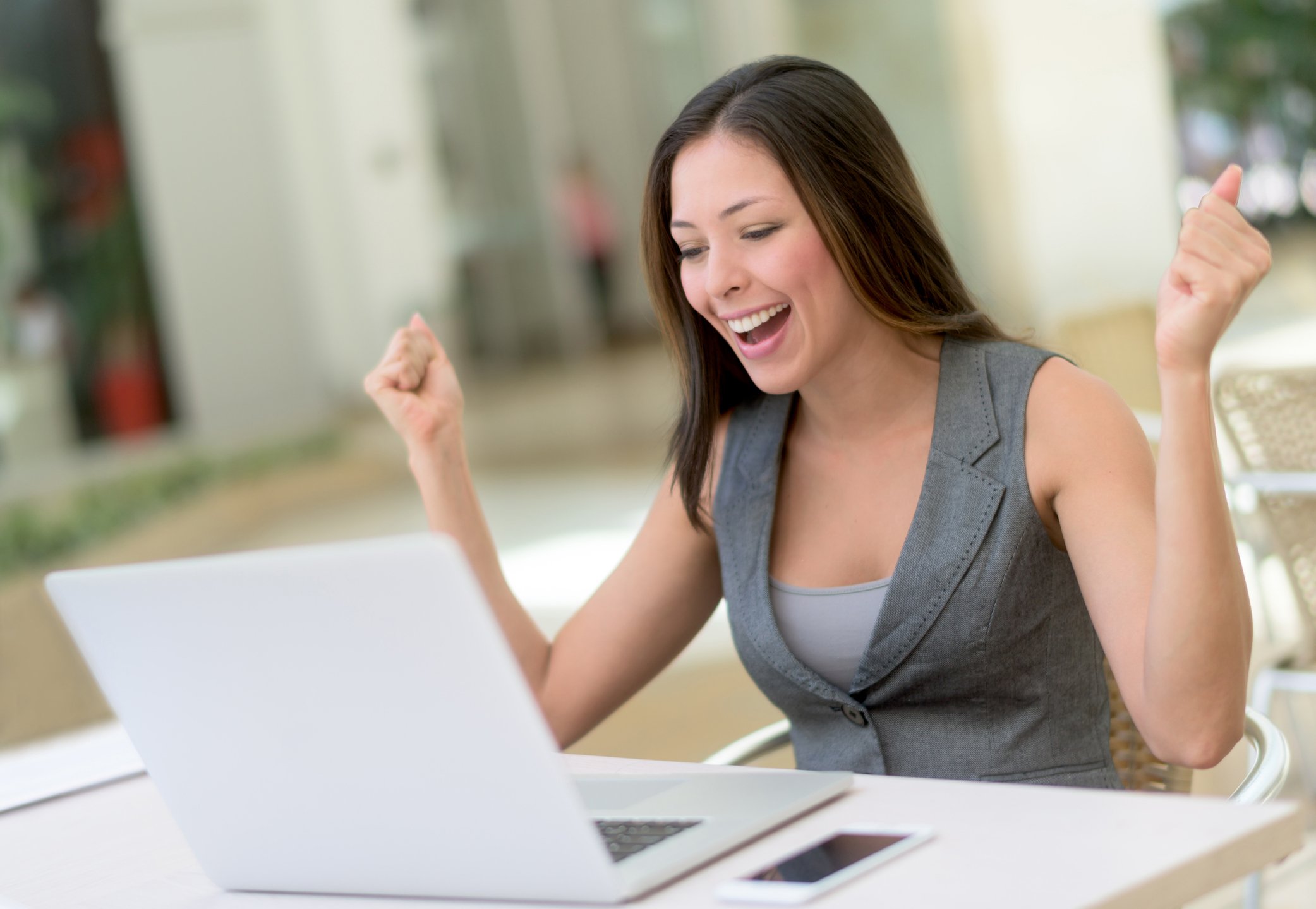 Woman smiling laptop
