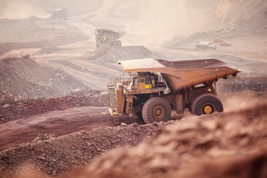 large truck driving at a mining operation.