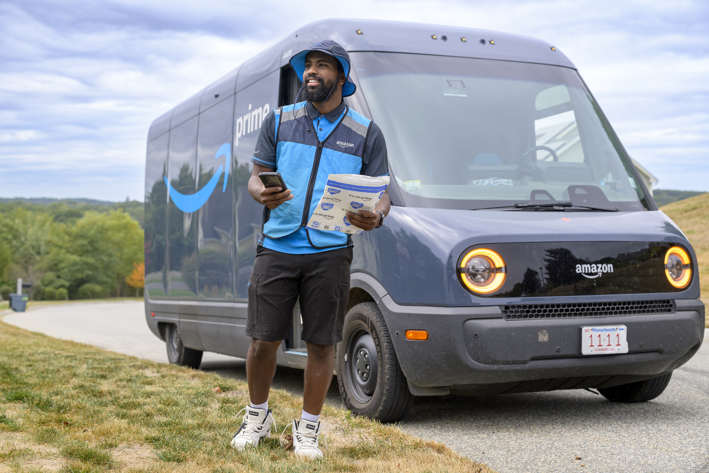 Amazon delivery person with a truck.