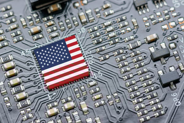 The American flag emblazoned on a computer chip. 