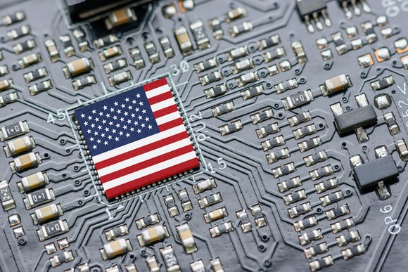 The American flag emblazoned on a computer chip. 