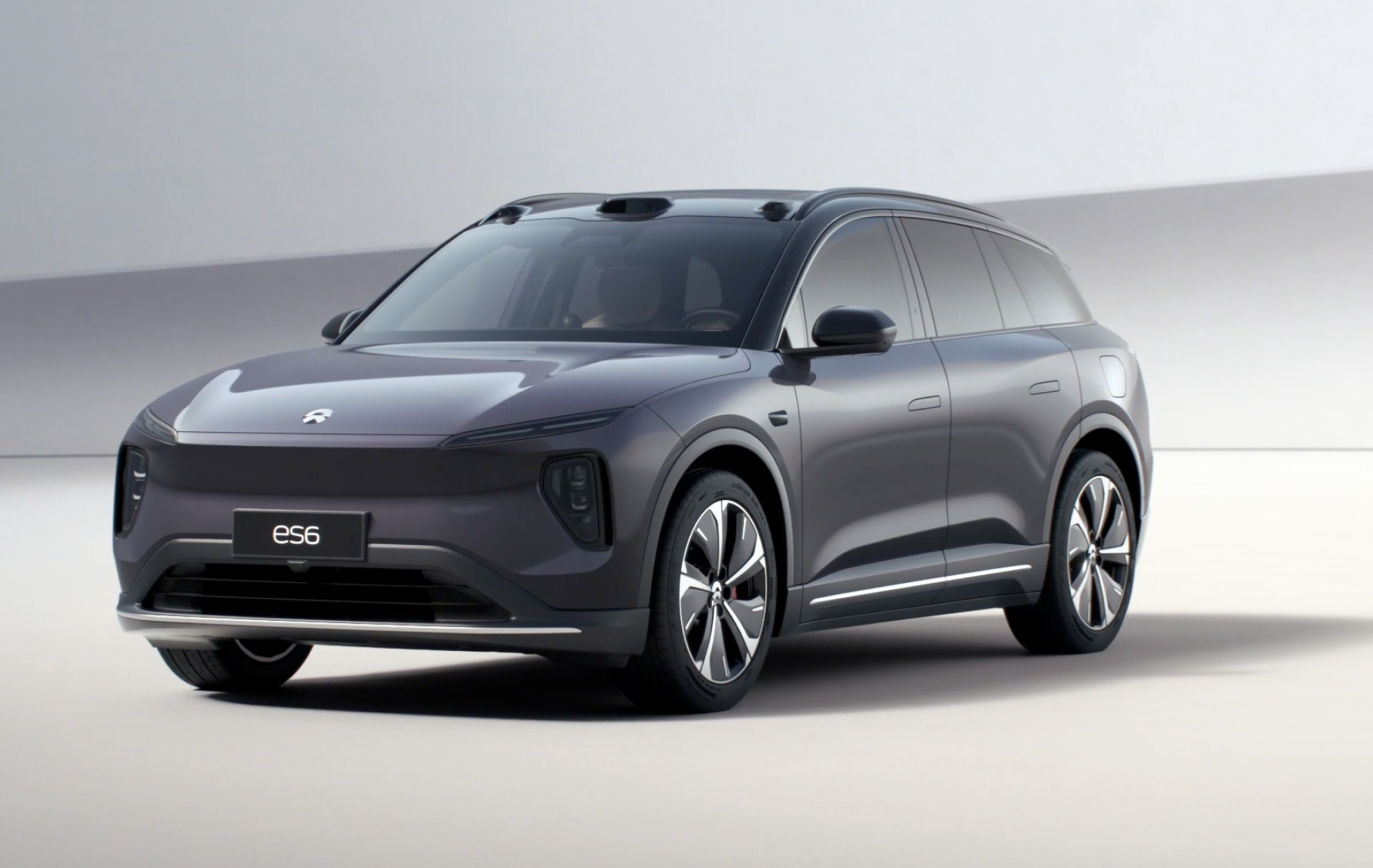 A gray Nio ES6 electric SUV. 