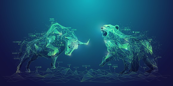Image of a bear and bull on a blue background.