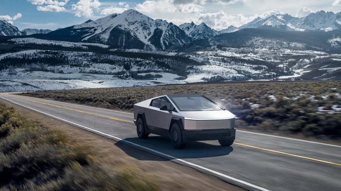 A Tesla Cybertruck on the open road.