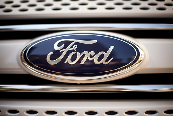 Ford front grill and logo on car.