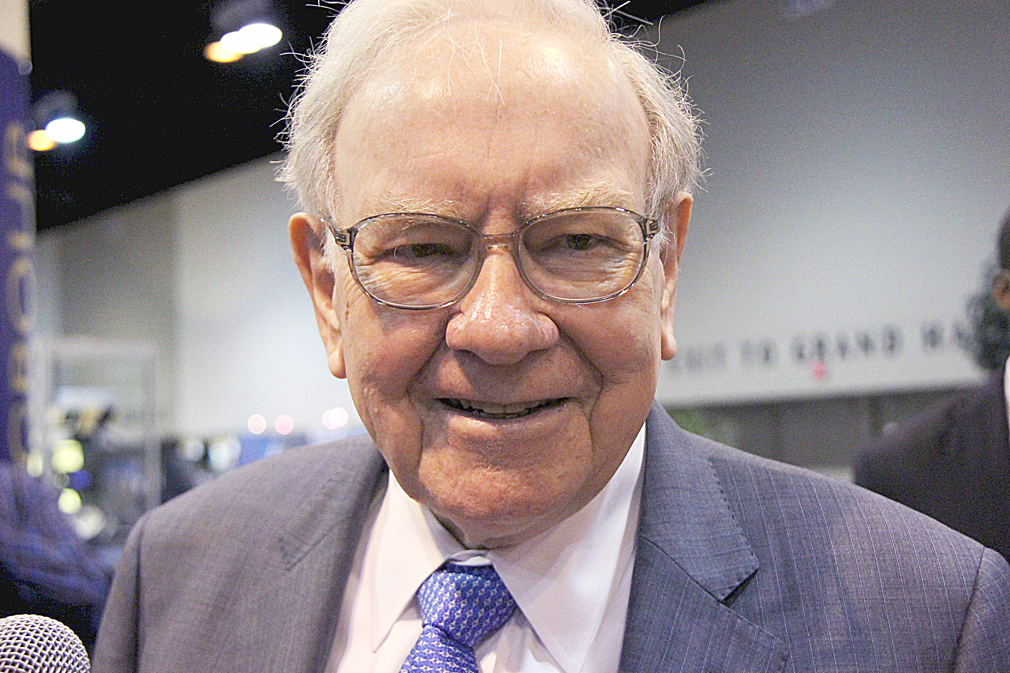 close-up shot of Warren Buffett being interviewed.