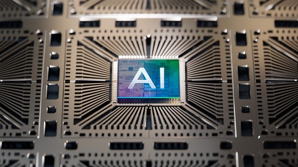 A computer chip labeled with "AI" sitting in a meta rack.