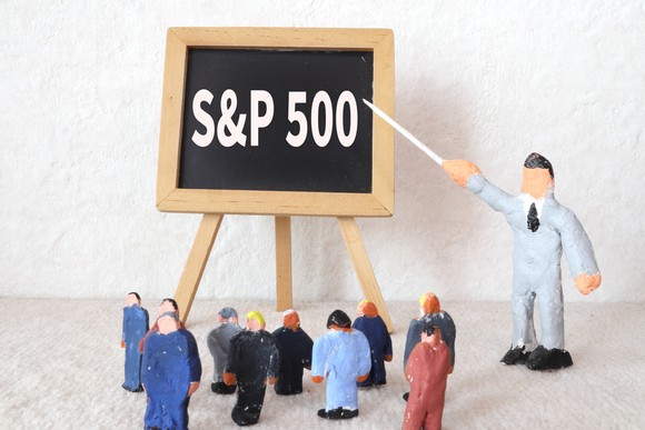 Clay figures gathered around a small chalkboard labeled "S&P 500."