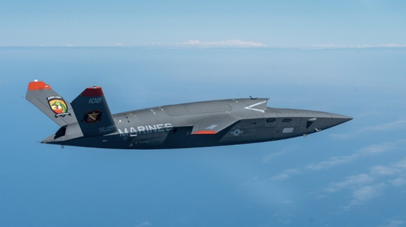 An XQ-58 Valkyrie is flying. 