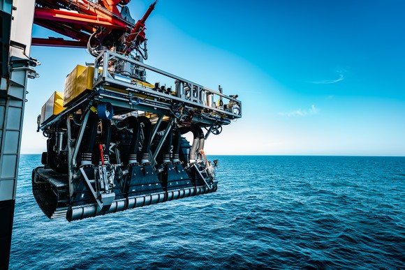 A nodule collector suspended over the Pacific Ocean. 
