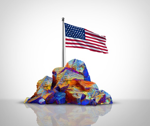 An American flag on top of minerals. 