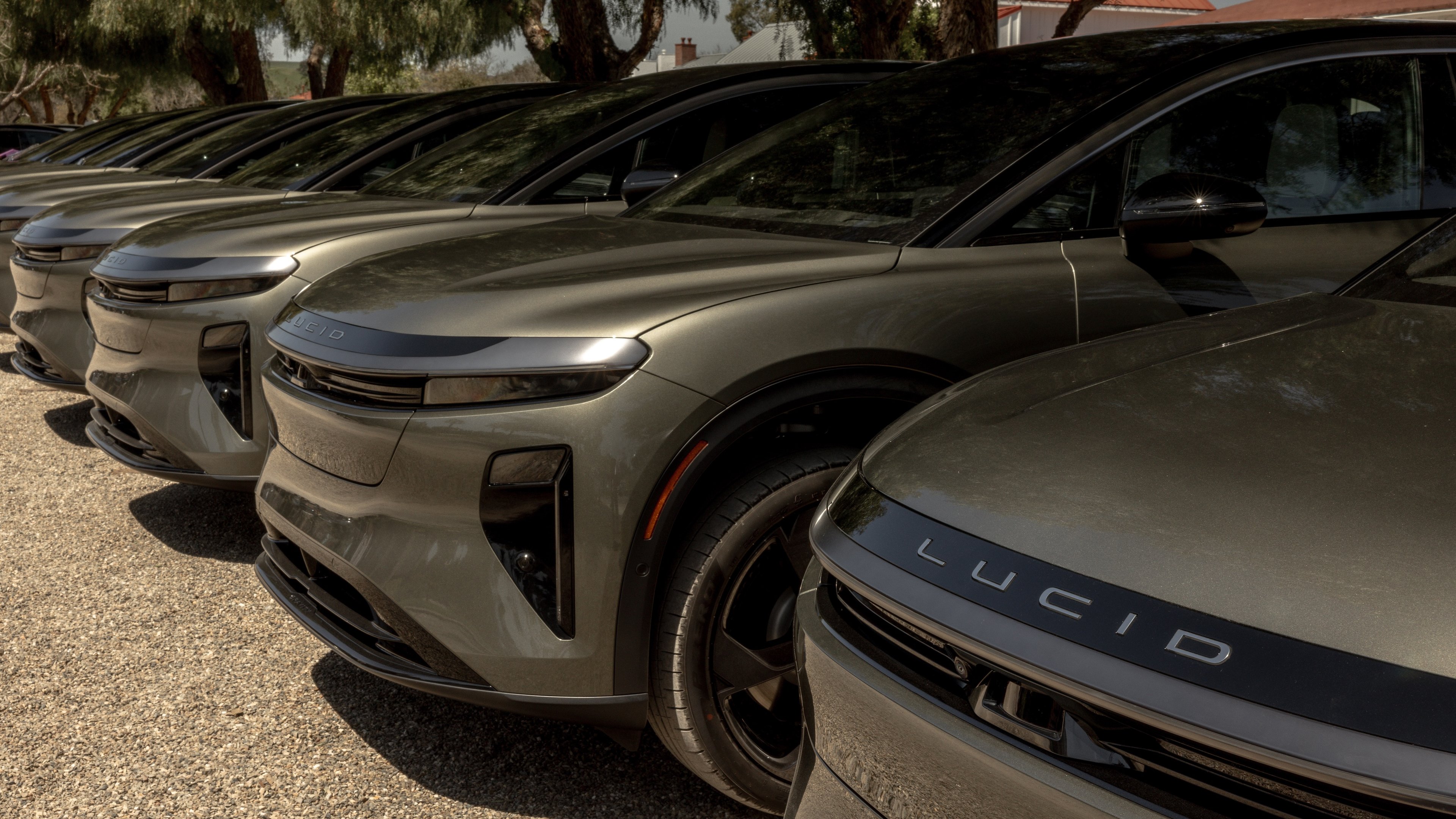 row of grey Lucid Gravity SUVs. 