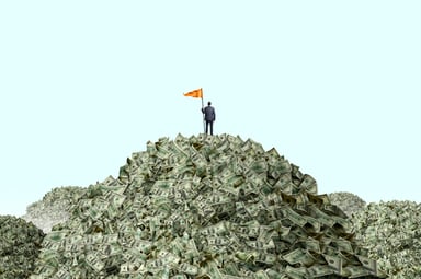 Investor on top of pile of money