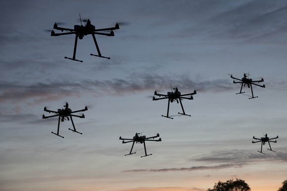Hexacopter drones flying in the air.