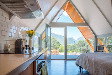 A home with a mountain view out the window