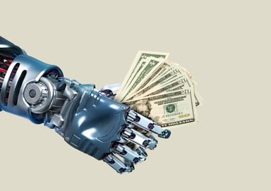 a robot hand holds a stack of bills