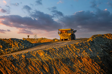 dump truck driving at a mine.