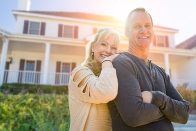 Getty - thoughtful smiling couple outside in sun