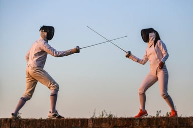 two people fencing sword fight battle