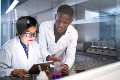 biotech pharma researchers talk lab