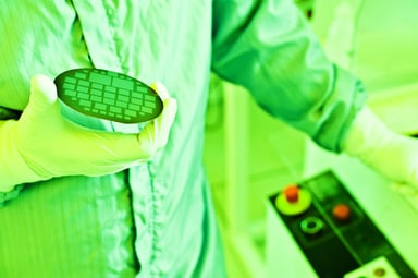 scientist lab technician holding wafer