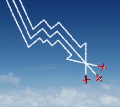 3 red airplanes leaving contrails pointing down.