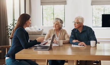 retirees speak with a financial advisor