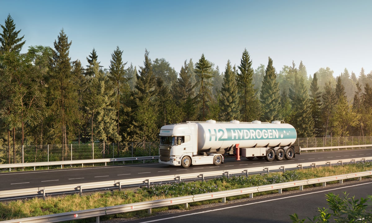A hydrogen fuel truck on a highway.