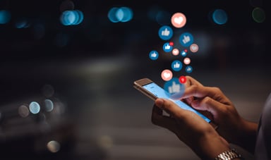A person using social media on their phone.