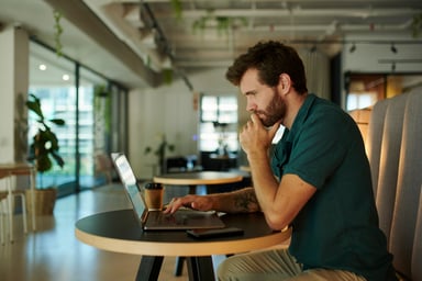 Man 30s serious laptop GettyImages-1430888003