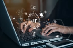 hands laptop and ETF