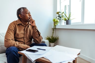 senior man thoughtful GettyImages-1412853474