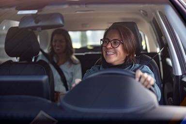 A person driving a car