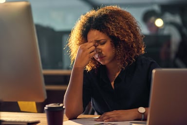 frustrated investor at computers