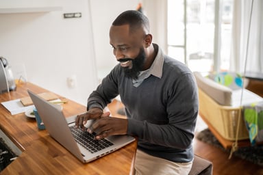 Man 30s laptop GettyImages-1337451732