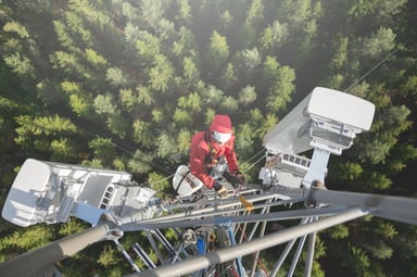Telecom worker installing 5G network.