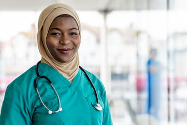 Getty - smiling in scrubs healthcare nurse
