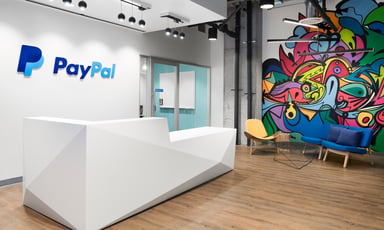 PayPal logo on wall of the Toronto office. IS PYPL