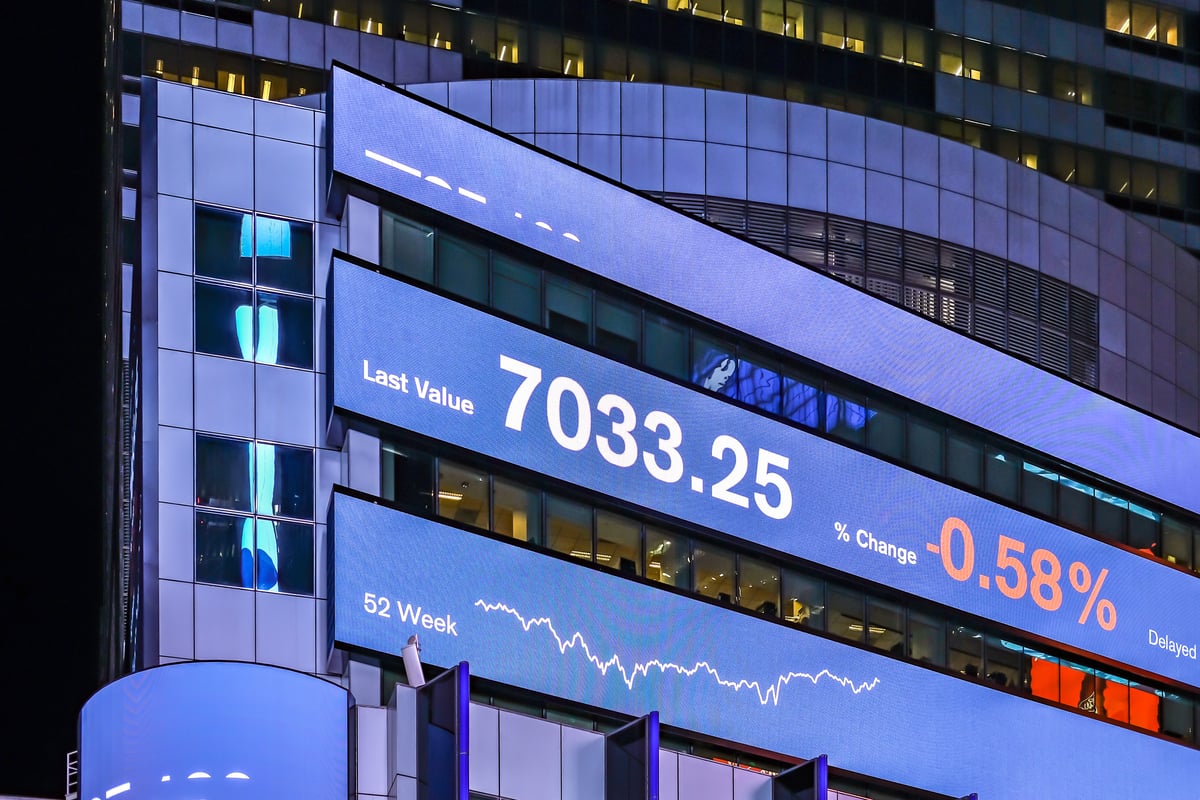 stock ticker tape on side of building