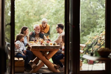 A group of people having an outdoor meal