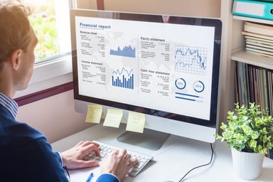 analyzing stock charts on a computer screen