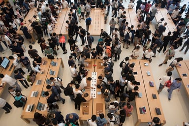 Apple-Store-crowd-overhead-product-tables