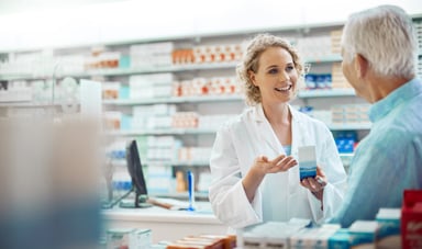 Pharmacist talking to patient