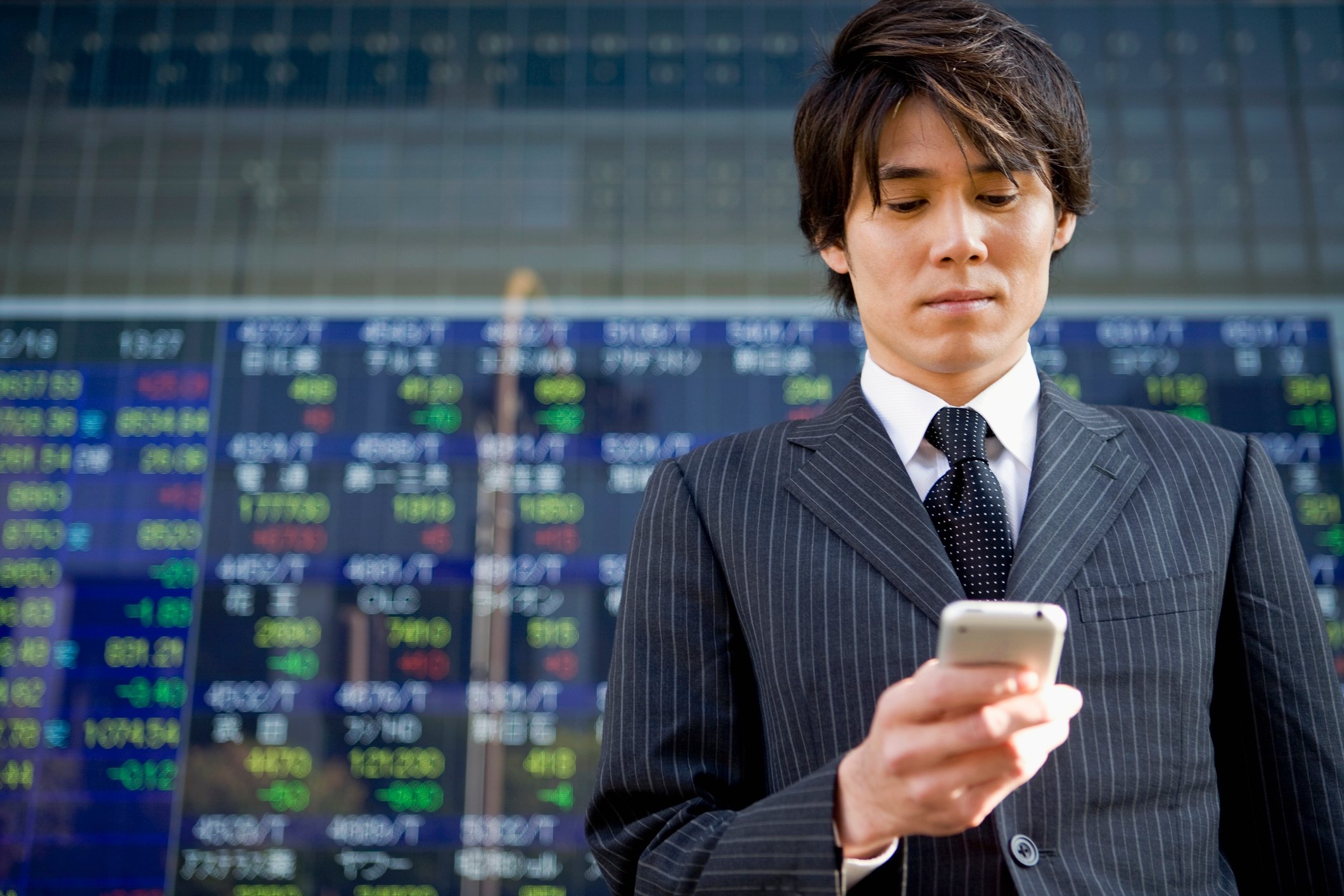 Businessman checking his phone.