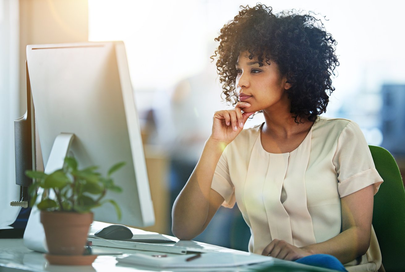 Office worker looking at computer screen