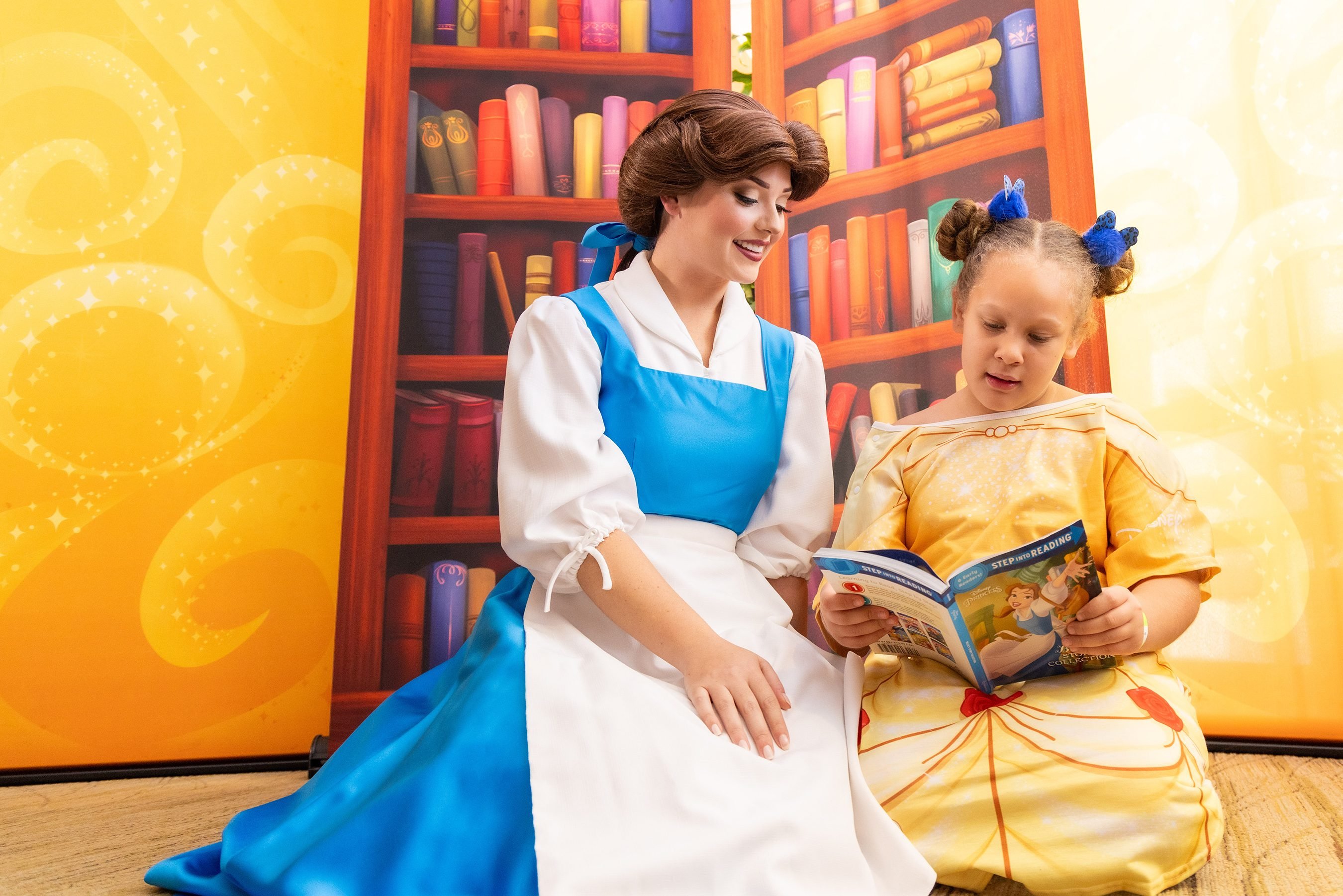Disney princess Belle and a guest.