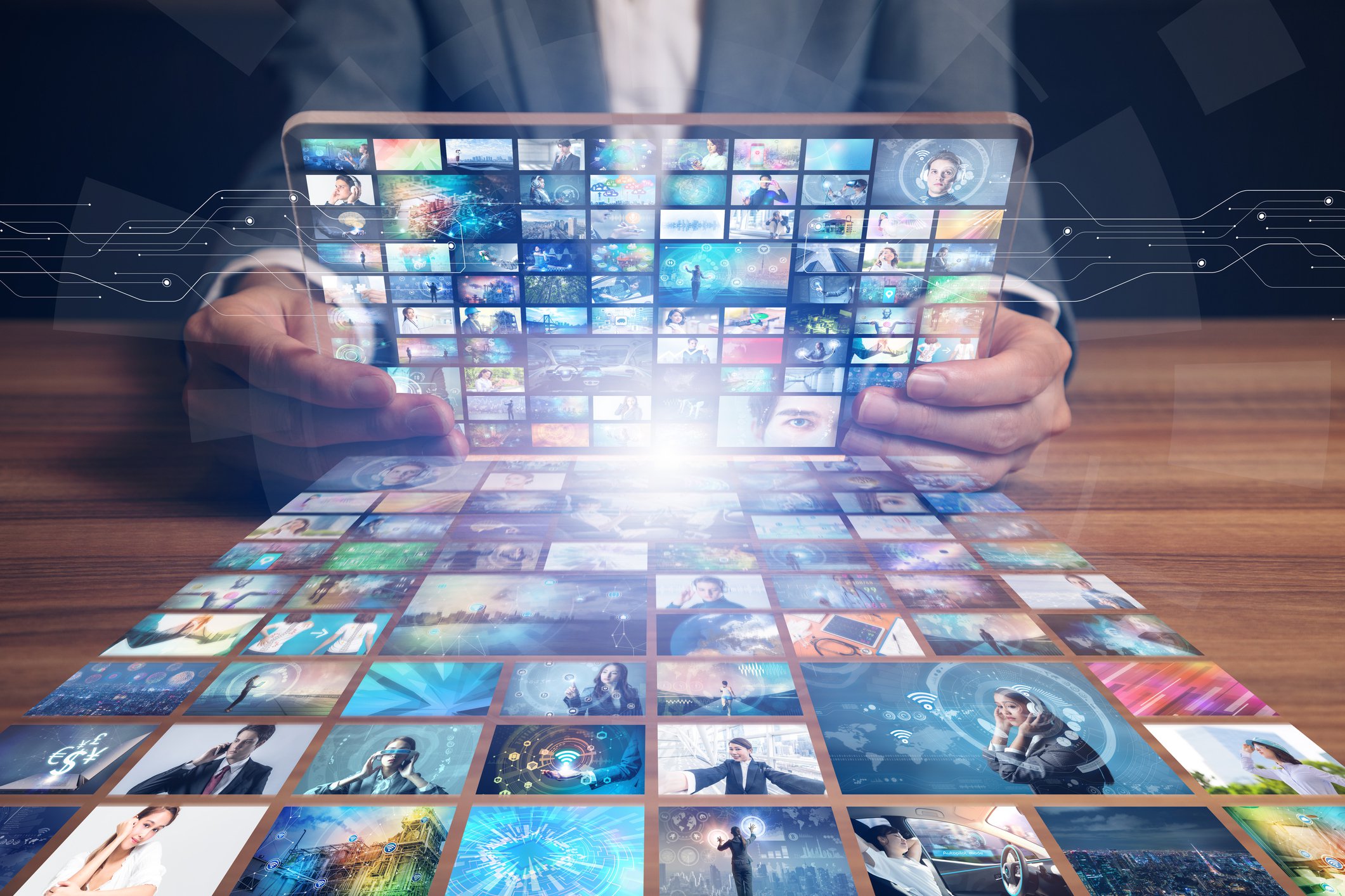 Laptop opening to reveal streaming screens