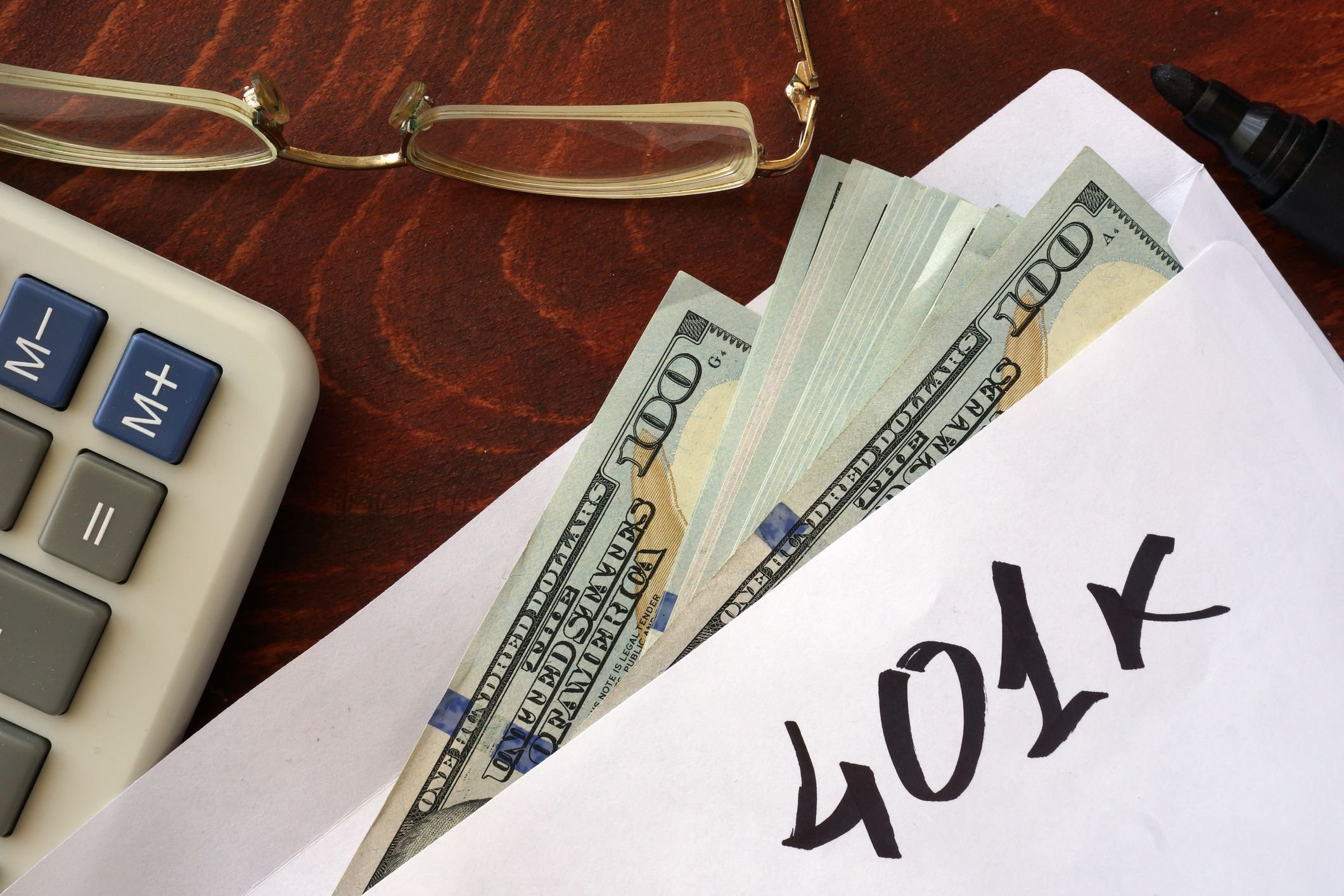 401k cash in envelope and calculator
