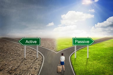 Woman with luggage at fork in road and choosing active or passive route