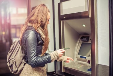 woman using atm